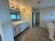 Elegant bathroom with double vanity and soaking tub at 10273 Aragon Crown Rd, Las Vegas, NV 89135