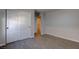 Bedroom with wood flooring and closet with white bi-fold doors at 10273 Aragon Crown Rd, Las Vegas, NV 89135