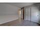 Bedroom with light wood floors and a closet with white bi-fold doors at 10273 Aragon Crown Rd, Las Vegas, NV 89135