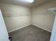 Walk-in closet with wire shelving and wood-look floors at 10273 Aragon Crown Rd, Las Vegas, NV 89135