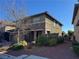 Two-story house with stone accents and landscaping at 10273 Aragon Crown Rd, Las Vegas, NV 89135