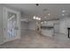 Spacious kitchen with white cabinets, stainless appliances, and an island at 10273 Aragon Crown Rd, Las Vegas, NV 89135