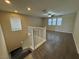 Upstairs loft area with wood-look flooring and ceiling fan at 10273 Aragon Crown Rd, Las Vegas, NV 89135