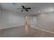 Upstairs loft area with a ceiling fan and white railing at 10273 Aragon Crown Rd, Las Vegas, NV 89135