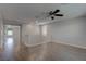Loft area with wood floors, fan, and railing at 10273 Aragon Crown Rd, Las Vegas, NV 89135