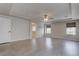 Spacious main bedroom with tray ceiling, ceiling fan, and bright, light filled windows at 10273 Aragon Crown Rd, Las Vegas, NV 89135