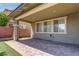 Outdoor patio with pavers and a covered area, perfect for entertaining and relaxing at 10273 Aragon Crown Rd, Las Vegas, NV 89135