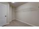 Walk-in closet featuring a white wire shelving unit and light wood flooring at 10273 Aragon Crown Rd, Las Vegas, NV 89135