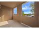 This balcony features an outdoor storage closet and views of the neighborhood at 10280 Gilmore Canyon Ct # 203, Las Vegas, NV 89129