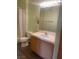 Full bathroom with single sink vanity, tub and shower, and laminate floors at 1050 E Cactus Ave # 2110, Las Vegas, NV 89183