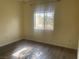 Bright bedroom with laminate flooring and a window offering natural light at 1050 E Cactus Ave # 2110, Las Vegas, NV 89183