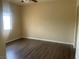 Simple bedroom with laminate flooring and window at 1050 E Cactus Ave # 2110, Las Vegas, NV 89183