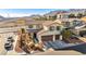 Two story home with solar panels, two car garage, and mountain views at 10611 Auburn Springs Ave, Las Vegas, NV 89166