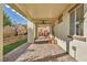 Covered patio with ceiling fan and brick pavers at 10611 Auburn Springs Ave, Las Vegas, NV 89166