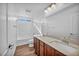 Bathroom boasts double vanity, tub, and shower at 10611 Auburn Springs Ave, Las Vegas, NV 89166