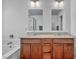 Bathroom with double vanity and stylish light fixtures at 10611 Auburn Springs Ave, Las Vegas, NV 89166