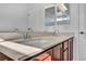 Double sink vanity with modern light fixtures at 10611 Auburn Springs Ave, Las Vegas, NV 89166