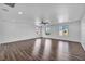 Large bonus room with wood flooring and ceiling fan at 10611 Auburn Springs Ave, Las Vegas, NV 89166