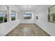 Bright dining room with tile floors and a chandelier at 10611 Auburn Springs Ave, Las Vegas, NV 89166