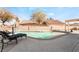 Inviting backyard oasis featuring a sparkling pool, lounge chairs, and patio area at 1064 Wide Brim Ct, Henderson, NV 89011