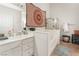 Bathroom with soaking tub, shower, and updated vanity at 1064 Wide Brim Ct, Henderson, NV 89011