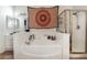 Bathroom features a large garden tub and shower at 1064 Wide Brim Ct, Henderson, NV 89011