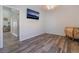 Bedroom with wood-look floors and built-in storage at 1064 Wide Brim Ct, Henderson, NV 89011