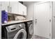 Laundry room with washer, dryer, and cabinets at 1064 Wide Brim Ct, Henderson, NV 89011