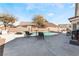 Sparkling pool and spa with patio furniture and basketball hoop at 1064 Wide Brim Ct, Henderson, NV 89011