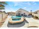 Large pool and spa surrounded by a spacious patio at 1064 Wide Brim Ct, Henderson, NV 89011