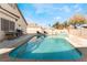 Inviting kidney-shaped pool with spacious patio area at 1064 Wide Brim Ct, Henderson, NV 89011