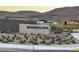 Ridgeline community entrance with landscaping and mountain views at 10739 Agate Cliffs Ave, Las Vegas, NV 89135