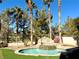 Relaxing backyard oasis with a sparkling pool and waterfall feature at 109 Lakewood Garden Dr, Las Vegas, NV 89148