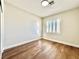 Bright bedroom with wood-look floors and window shutters at 109 Lakewood Garden Dr, Las Vegas, NV 89148