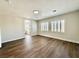 Bright bedroom with wood-look floors and ensuite bathroom at 109 Lakewood Garden Dr, Las Vegas, NV 89148