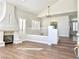 Elegant living room with hardwood floors, a fireplace and high ceilings at 109 Lakewood Garden Dr, Las Vegas, NV 89148