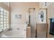 Bathroom with shower and soaking tub at 1105 Thornfield Ln, Las Vegas, NV 89123