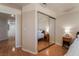 Mirrored closet doors and a nightstand in bedroom at 1105 Thornfield Ln, Las Vegas, NV 89123