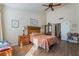 Cozy bedroom with a queen-size bed and built in shelving at 1105 Thornfield Ln, Las Vegas, NV 89123