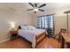 Bright bedroom featuring a double bed and wood flooring at 1105 Thornfield Ln, Las Vegas, NV 89123