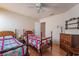 Bedroom with two twin beds and wood furniture at 1105 Thornfield Ln, Las Vegas, NV 89123