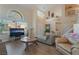 Open and airy living room featuring a comfortable seating area and large windows at 1105 Thornfield Ln, Las Vegas, NV 89123