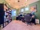 Home office with two workstations and built-in shelving at 1297 Paseo Del Oso Ln, Henderson, NV 89002