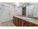 Modern bathroom with double sinks, granite countertop, and a walk-in shower at 150 Las Vegas Blvd # 1903, Las Vegas, NV 89101