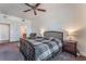 Bright bedroom with ceiling fan, carpeted floor, and dresser at 150 Las Vegas Blvd # 1903, Las Vegas, NV 89101