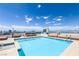 Inviting rooftop pool with lounge chairs and a hot tub, offering stunning city views at 150 Las Vegas Blvd # 1903, Las Vegas, NV 89101