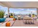 Modern rooftop terrace furniture with city views under a pergola at 150 Las Vegas Blvd # 1903, Las Vegas, NV 89101