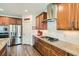 Modern kitchen with stainless steel appliances and granite countertops at 1738 Sonoran Bluff Ave, Henderson, NV 89014