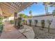 Landscaped courtyard with stone path and pergola at 1901 Calle De Espana, Las Vegas, NV 89102