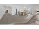 Open concept dining area with raised platform and chandelier at 1901 Calle De Espana, Las Vegas, NV 89102